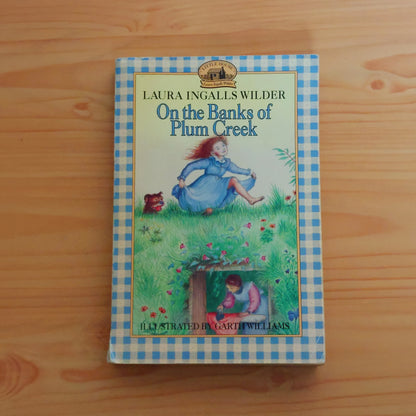 On the Banks of Plum Creek by Laura Ingalls Wilder (Little House on the Prairie)