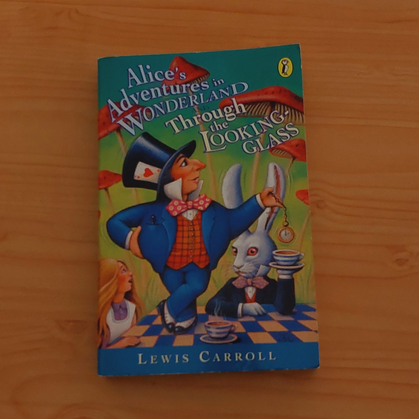 Alice's Adventures in Wonderland and Through the Looking Glass by Lewis Carroll