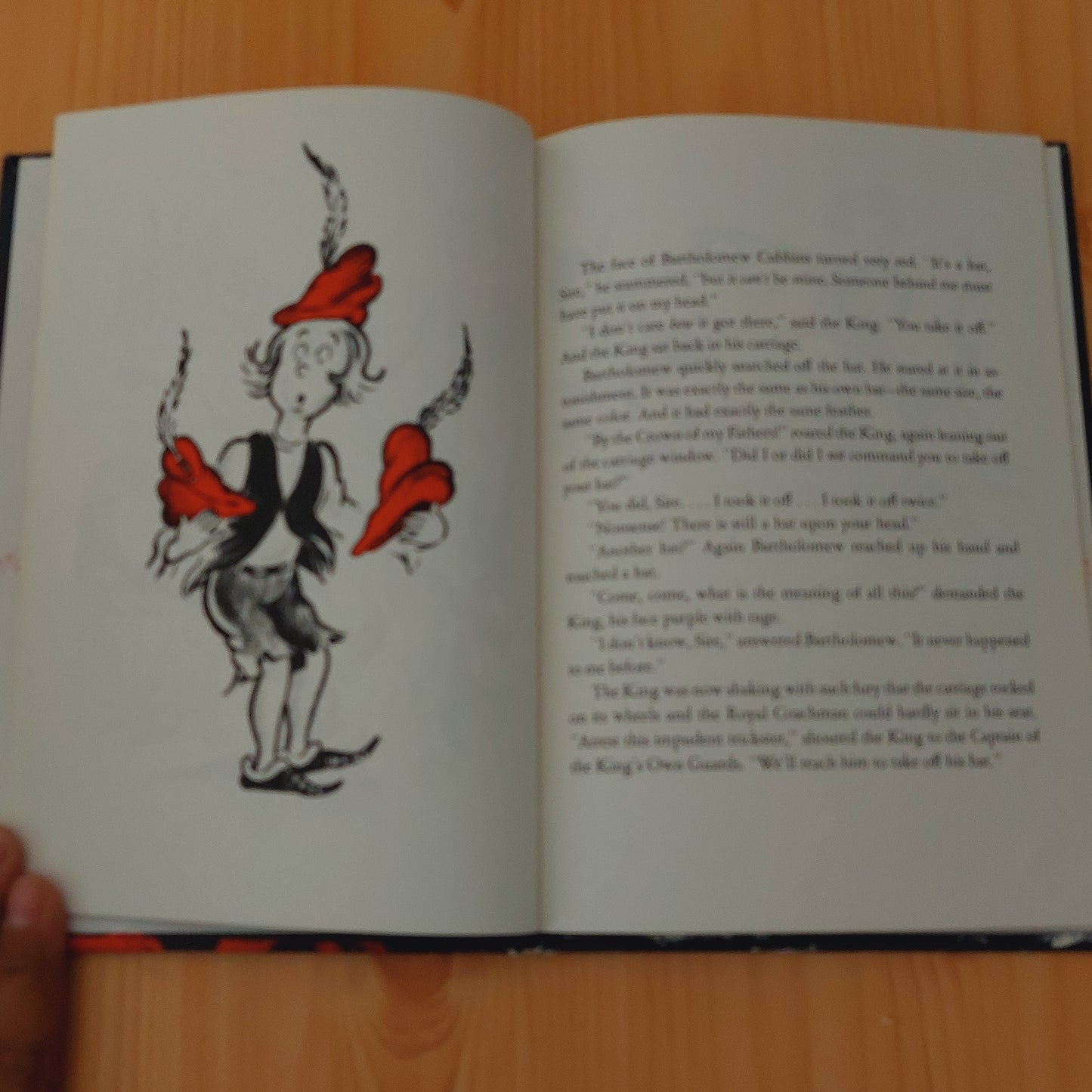 The 500 Hats of Bartholomew Cubbins by Dr. Seuss