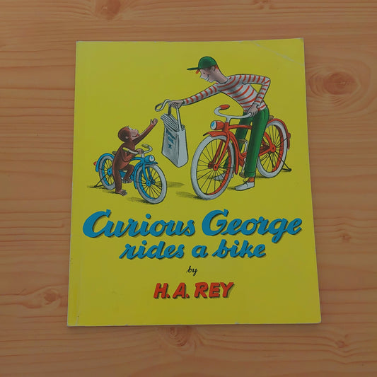 Curious George Rides a Bike